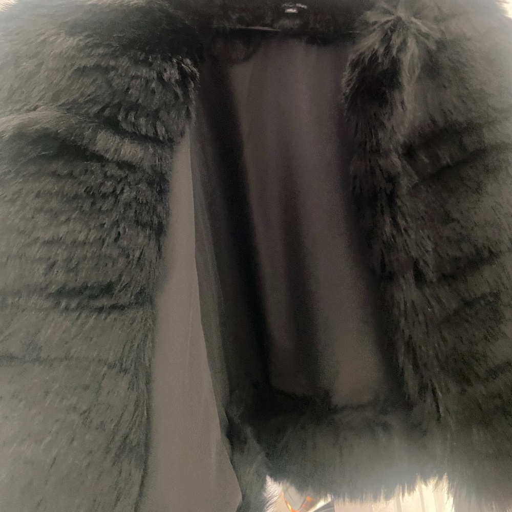 Women’s black fur coat